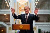 Vladimir Putin under en presskonferens efter toppmötet i Minsk.
