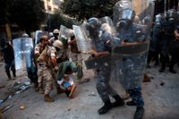 Sammandrabbningar mellan demonstranter och säkerhetsstyrkor i Beirut den 8 augusti.