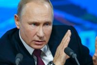 Vladimir Putin varnar för nukleär katastrof. 