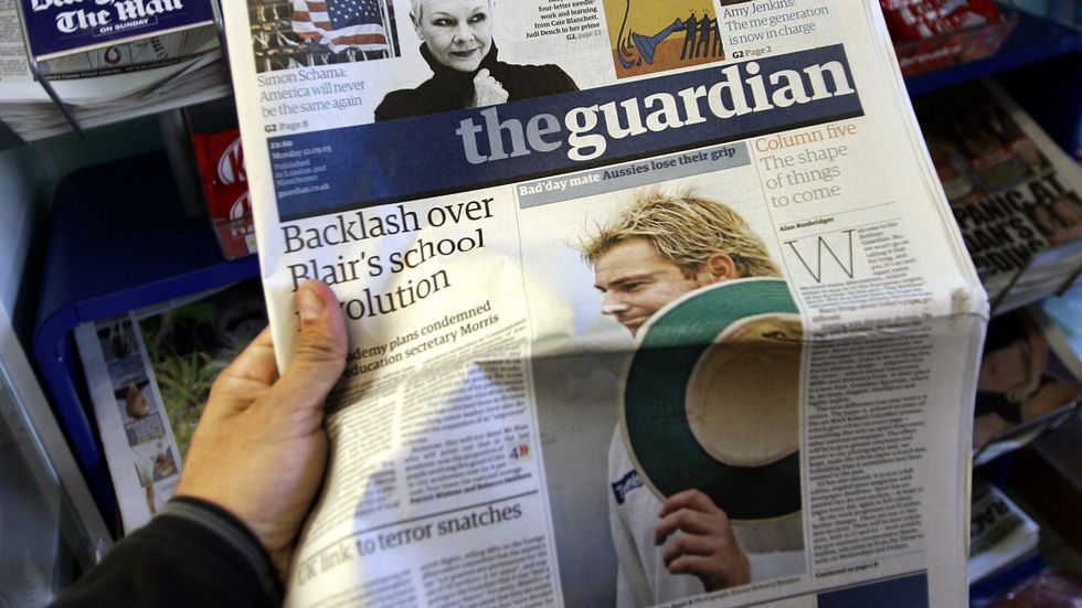  Britain's daily newspaper The Guardian, printed on new large tabloid format, is seen at a mini market in London, Monday Sept. 12, 2005. The new-look Guardian is now printed in the so-called Berliner format and is the latest step in the history of the paper spanning more than 180 years. 