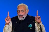 Indiens premiärminister Novandra Modi talar vid klimattoppmötet i Glasgow.