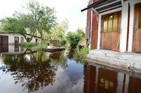 Översvämmad villaträdgård i Lönneberga, Småland.