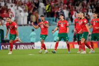 Marocko jublar efter segern mot Spanien i åttondelsfinalen. 
