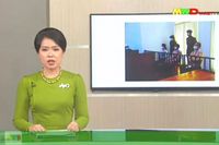 Militärägda tv-kanalen Myawaddy TV visar bilder på Aung San Suu Kyis framträdande i rätten tidigare i år. Arkivbild.