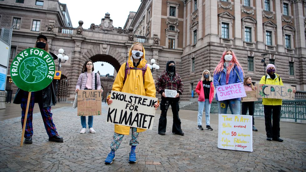 Miljöaktivisten Greta Thunberg vid en manifestation på Myntorget i Stockholm tidigare i oktober. I december ska hon för en dag vara chefredaktör för Dagens Nyheter.