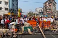 Demonstrationer mot Myanmars militärstyre i Rangoon.