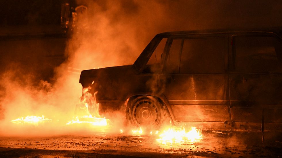En bil brinner i Malmö den 16 augusti i år.