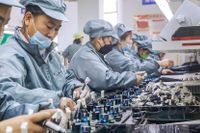 Arbetare i en fabrik i Anhui-provinsen.
