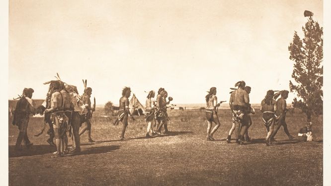 Arikara Medicine Ceremony - Dance of the Fraternity, 1908. [Native Americans in North Dakota]. Photogravure, plate 158 from "The North American Indian, volume 5" (1909).