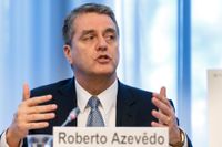WTO-chefen Roberto Azevédos ekonomer sänker prognosen för global handelstillväxt 2019 och 2020. Arkivbild