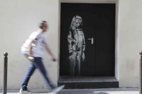 Ett verk av Banksy i Paris.