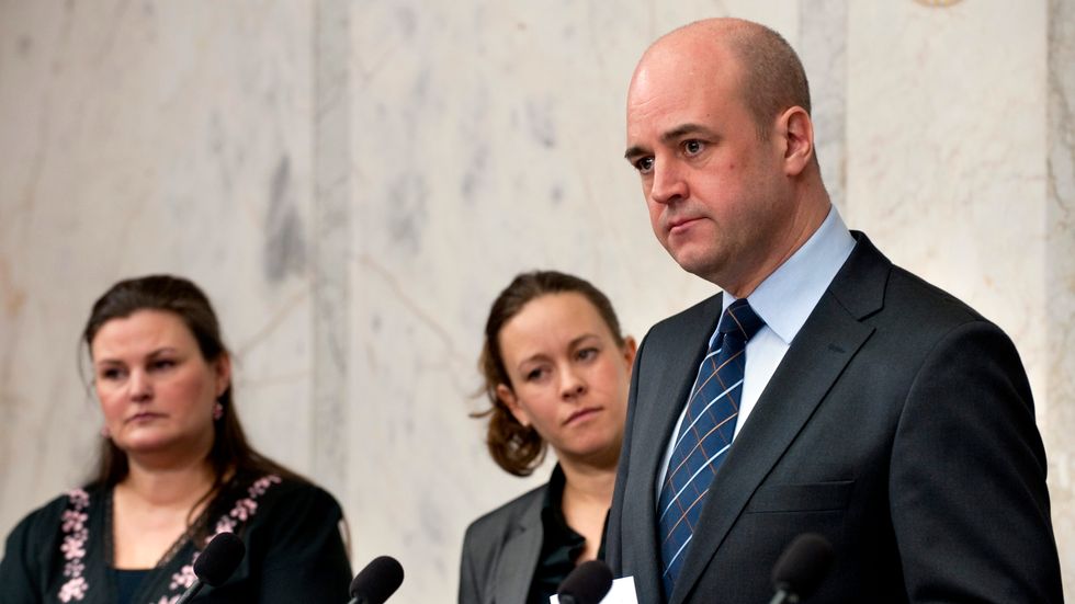 Dåvarande statsminister Fredrik Reinfeldt etablerade 2011 en ohållbar politik tillsammans med Miljöpartiet – då representerade av Maria Wetterstrand och Mikaela Valtersson.