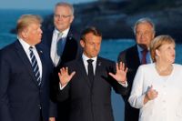 G7-ledarna samlas för ett gruppfoto på söndagen.