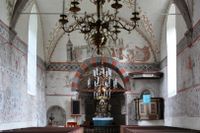 Portarna till himlen och helvetet målade på 1400-talet, av den anonyme Passionsmästaren, i triumfbågen i Mästerby kyrka på Gotland. 