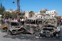 En bild från den syriska nyhetsbyrån Sana visar staden Latakia i Syrien efter att en bilbomb har exploderat.