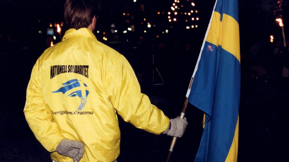 Sverigedemokratisk demonstrant i samband med firandet av Karl XII:s dödsdag, 30 november 1997. 