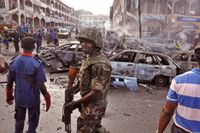 Arkivbild från juni, 2014. Visar förödelsen efter en explosion i Abuja, Nigeria. FN varnar nu för att barn misstänkliggörs när allt fler unga utnyttjas som självmordsbombare av extremistgrupper.