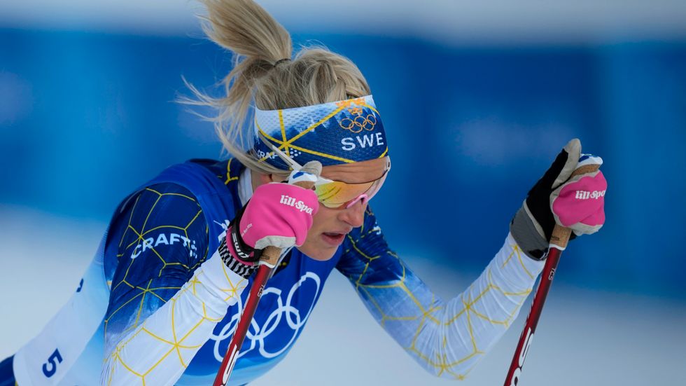 Skidstjärnan Frida Karlsson under OS.