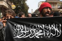 Jabhat al-Nusras flagga i en protest mot Syriens diktator al-Assad