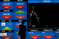 Börserna föll på bred front i Europa i går. Ovan syns nedåtriktade pilar på Warszawabörsen.