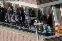Bild från polisens tillslag mot en bostad i Arnhem på torsdagen.
