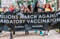 Protester i Sydney mot massvaccination. 