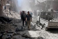 Skadade byggnader i Aleppo efter flyganfall den 26 juli.
