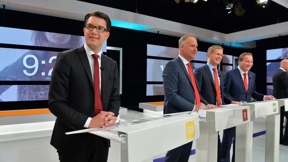 Fyra nyanser av rött. Partiledarna för SD, V, MP och S i SVT:s slutdebatt 2014.