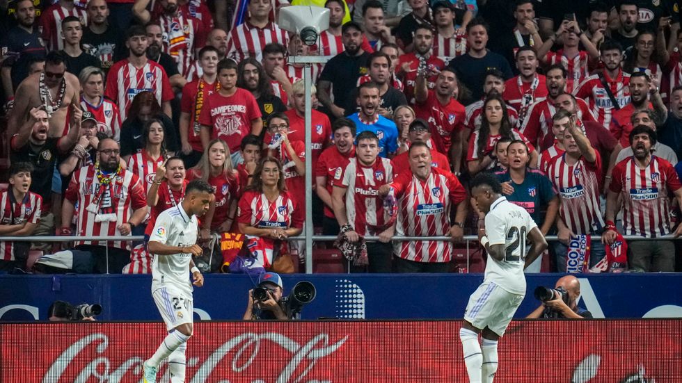 Vinícius Júnior, höger, utsattes för rasistiska glåpord efter matchen mot Atlético Madrid.