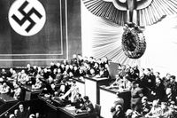 Adolf Hitler under ett möte i det tyska riksdagshuset den 19 mars 1938 i Berlin, Tyskland.