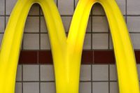 McDonald's. Symbol för optimistiska teorier.