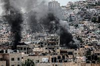 Rök stiger över flyktinglägret i Jenin på norra delarna av Västbanken.