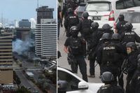 Poliser på plats i närheten av den plats där explosionerna skedde i Jakarta på torsdagsmorgonen svensk tid.