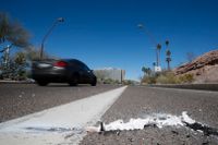 Bilar passerar olycksplatsen i Tempe Arizona. Arkivbild.