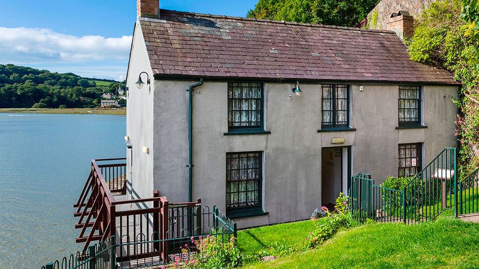 The Boathouse, poeten Dylan Thomas hem i Laugharne, Carmarthenshire i Wales.