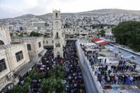 Palestinier ber i staden Nablus på Västbanken, den 24 maj i år, för att fira Eid al-Fitr. 