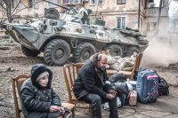 Ryska trupper i den ukrainska staden Mariupol den 9 april tidigare i år.