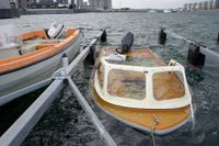 Sjunkna båtar i Limhamn efter stormen Simone på tisdagen.