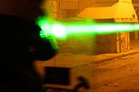 Under protester i Grekland används laserpekare för att störa polisen.