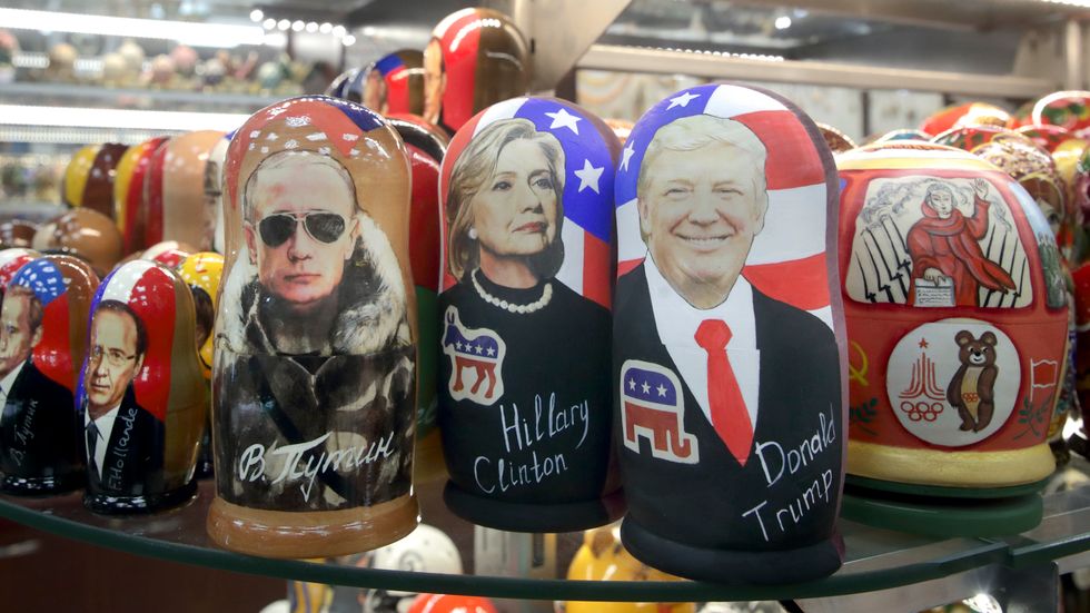  Traditional Russian wooden dolls called Matreska depicting from left, French president Francois Hollande, Russian president Vladimir Putin and US presidential candidates Hillary Clinton and Donald Trump are displayed in a shop in Moscow 