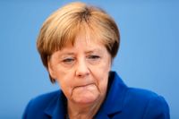 Angela Merkels partikamrater kräver förbud mot kläder som täcker ansiktet.