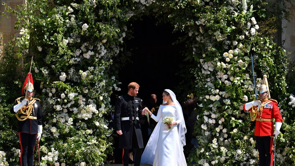 Prince Harry and Meghan Markle leave St. George's Chapel in Windsor Castle after their wedding ceremony in Windsor