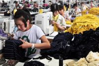 Över fem miljoner människor väntas bli arbetslösa när Kina ska ställa om arbetskraften från att jobba i fabriker till mer kvalificerade yrken.