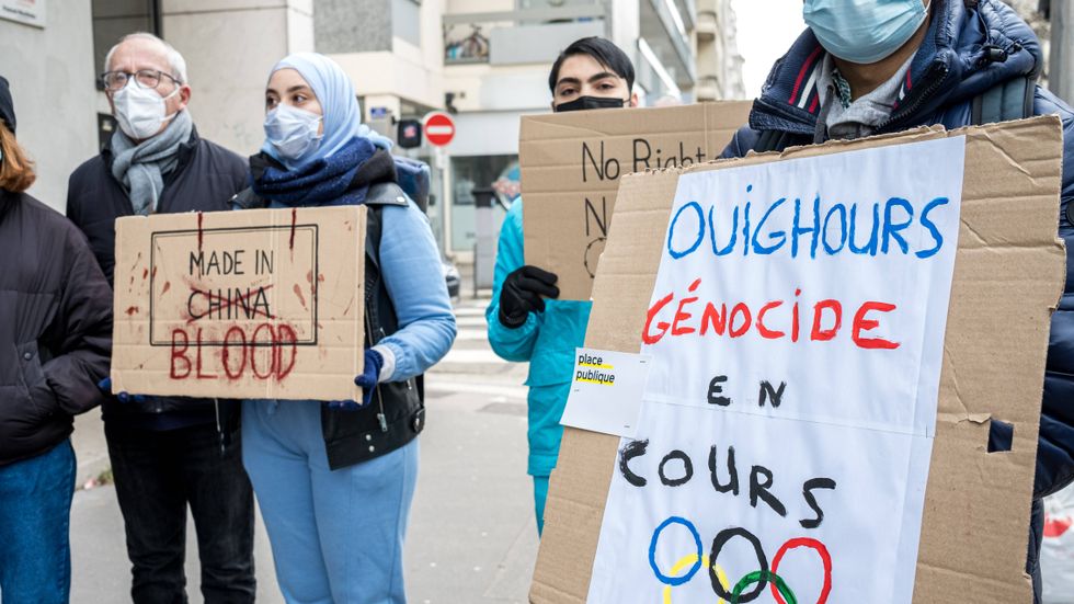 Demonstranter utanför det kinesiska konsulatet i franska Lyon krävde förra helgen en diplomatisk bojkott av vinter-OS i Peking.