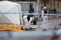 Kriminaltekniker undersöker brottsplatsen efter en dödsskjutning i Gävle i november förra året.
