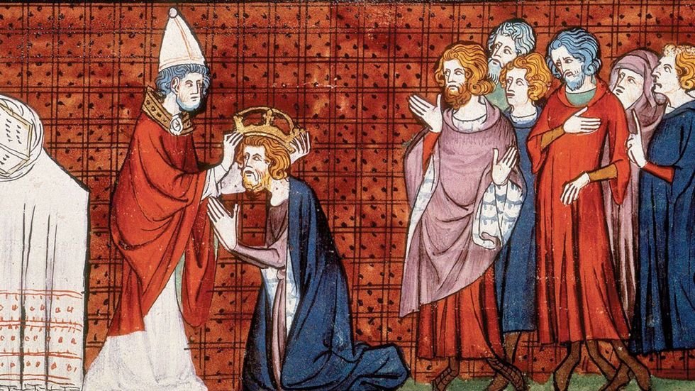 Karl den store låter sig krönas av påven i Rom år 800. Illustration ur ”Les chroniques de France ou de St-Denis” från 1300-talet.