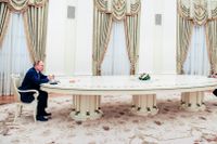 Vladimir Putin under mötet med Tysklands förbundskansler Olaf Scholz. 