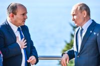 Naftali Bennett och Vladimir Putin, 2021.