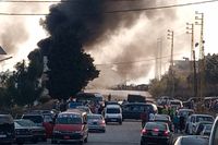 Rök stiger upp från explosionsplatsen i Libanon.